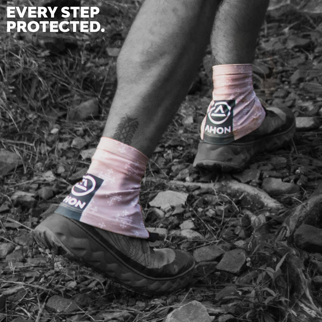 Trail runner wearing Ahon Apo 2 gaiters on rocky terrain, protecting ankles during rocky ascent