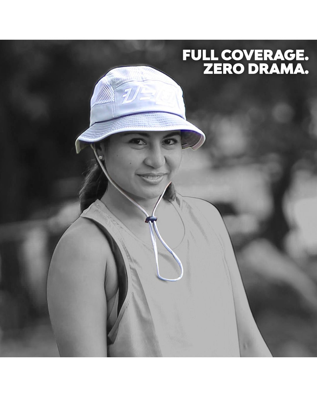 runner wearing the Ahon Baybayin Bucket Hat (Gray) on trail, smiling with full sun coverage.