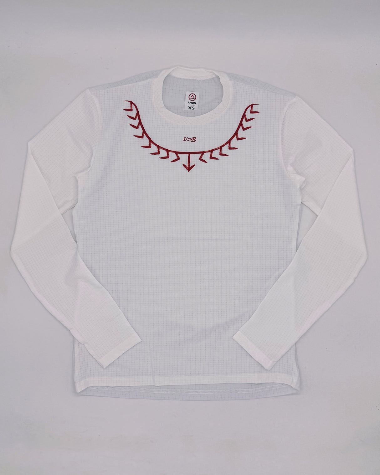 flat lay shot of Ahon Koling White long sleeve trail shirt