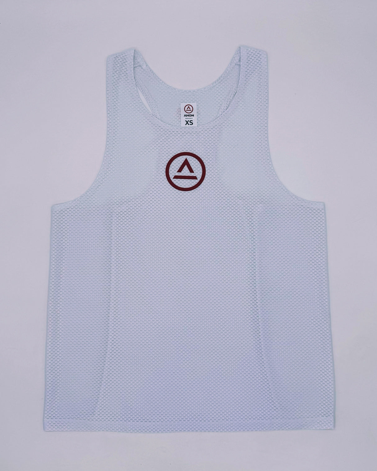 Front view of KSU Singlet 1 in white with red Ahon logo – trail mesh running top