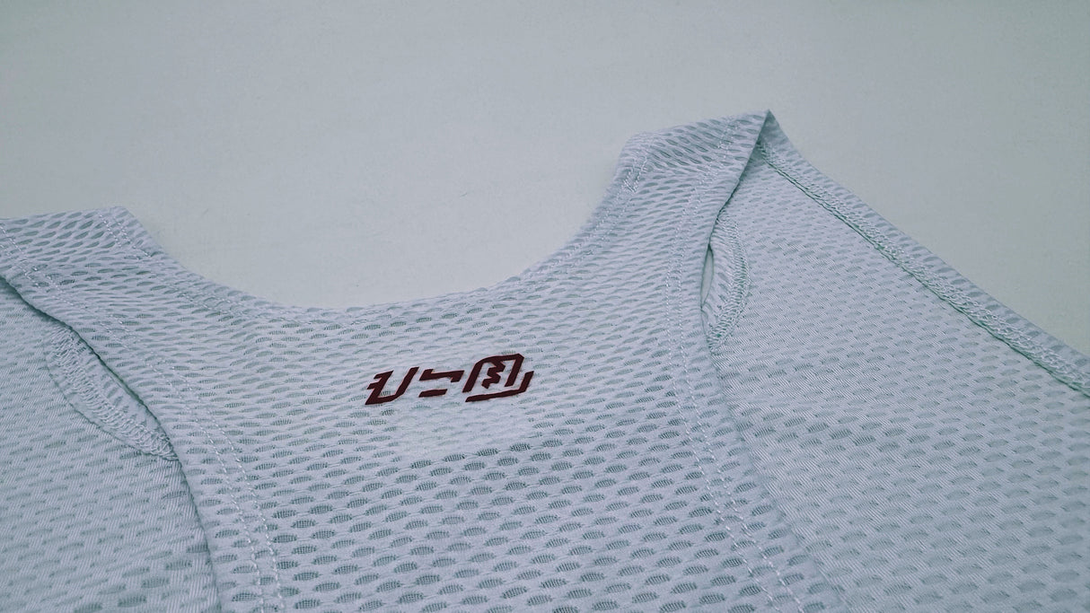 Close-up of KSU Singlet 1 fabric texture – breathable and quick-drying