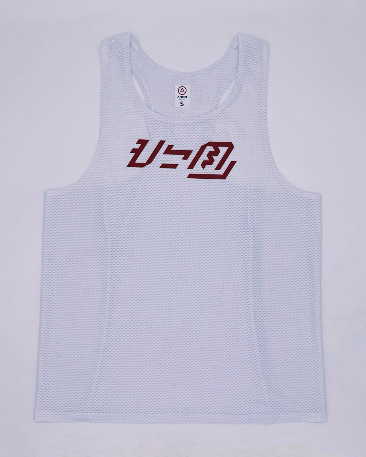 Front view of Ahon KSU Singlet 2 in white with red Baybayin logo