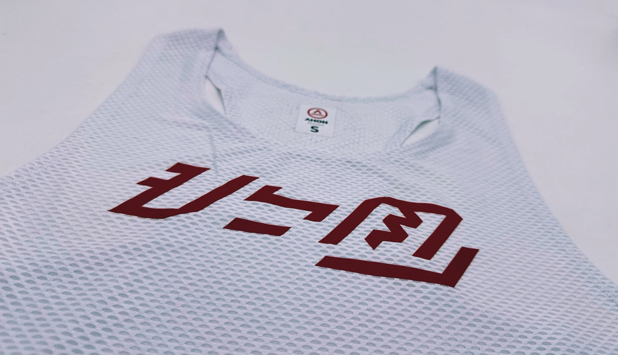 Close-up of red Baybayin-style logo on the KSU Singlet 2