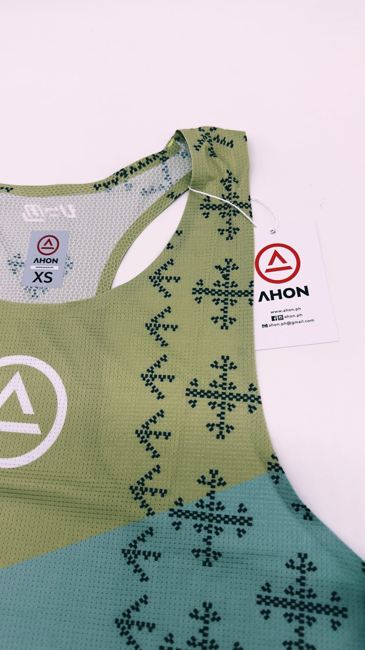Zoomed detail of Singlet Pro Colorway 2 fabric showing trail-ready texture and indigenous-inspired print