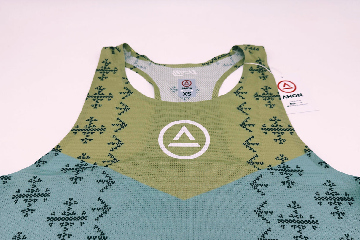 Zoomed detail of Singlet Pro Colorway 2 fabric showing trail-ready texture and indigenous-inspired print