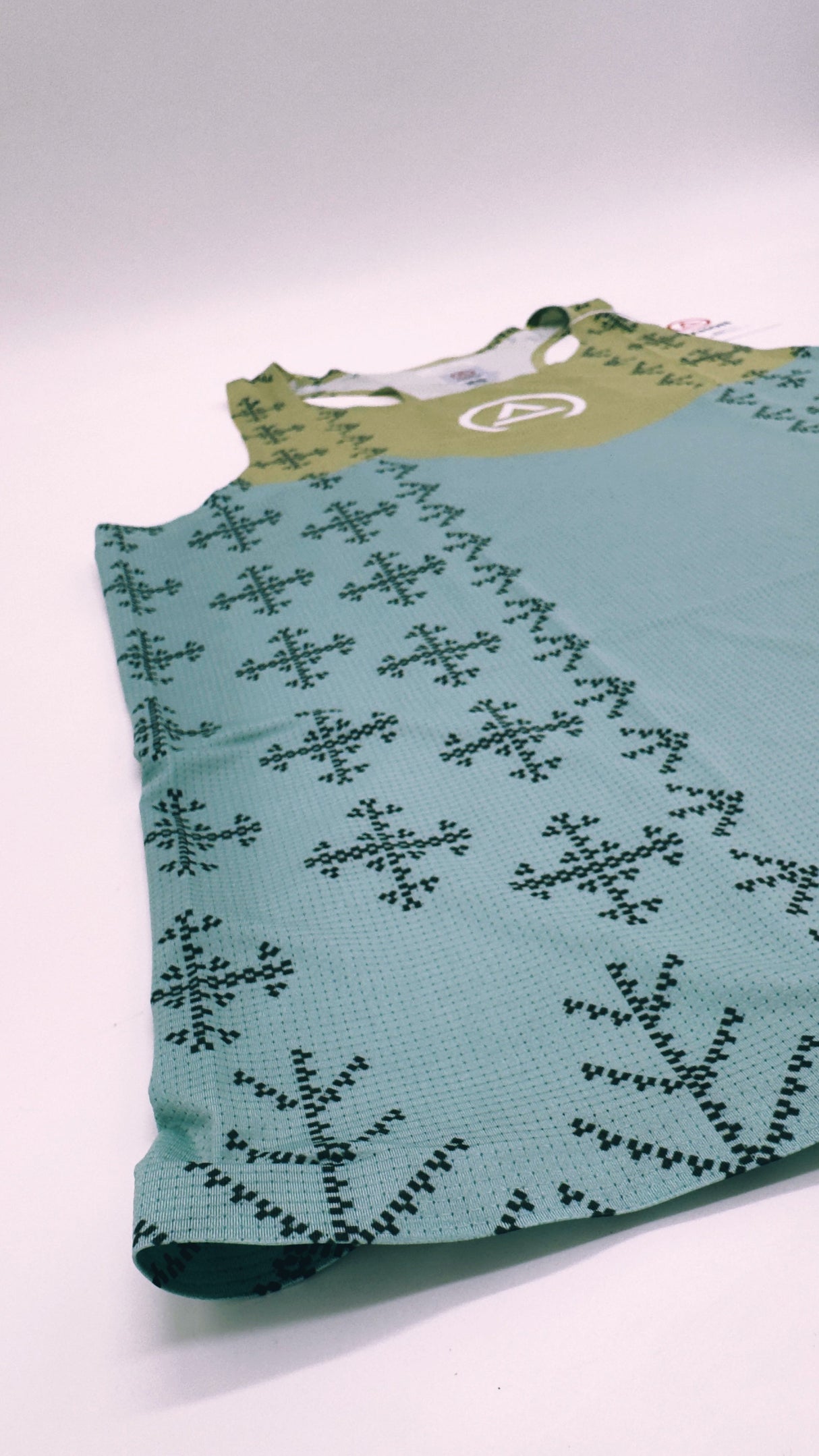 Zoomed detail of Singlet Pro Colorway 2 fabric showing trail-ready texture and indigenous-inspired print