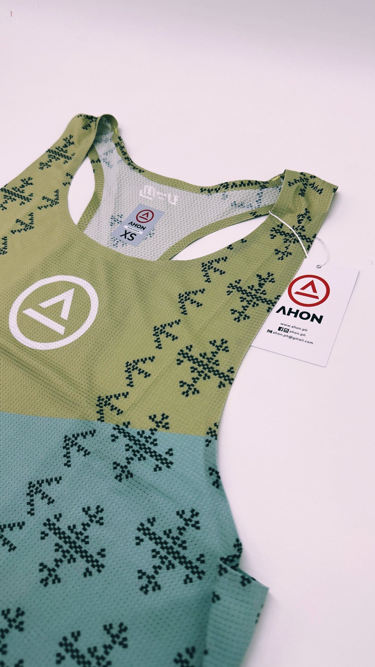 Zoomed detail of Singlet Pro Colorway 2 fabric showing trail-ready texture and indigenous-inspired print