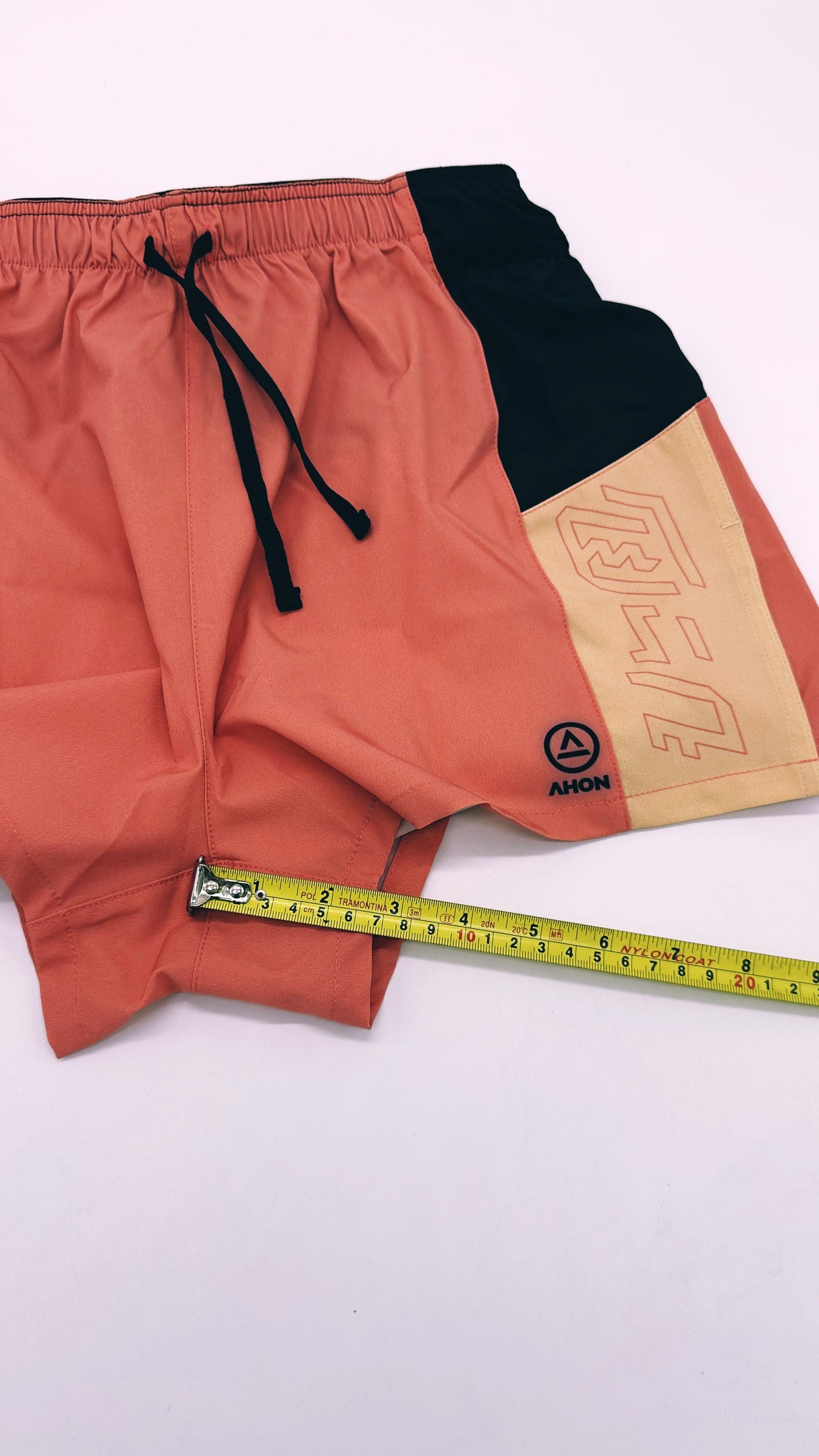 Flatlay of Ahon Trail Shorts Pro showing 3-inch inseam