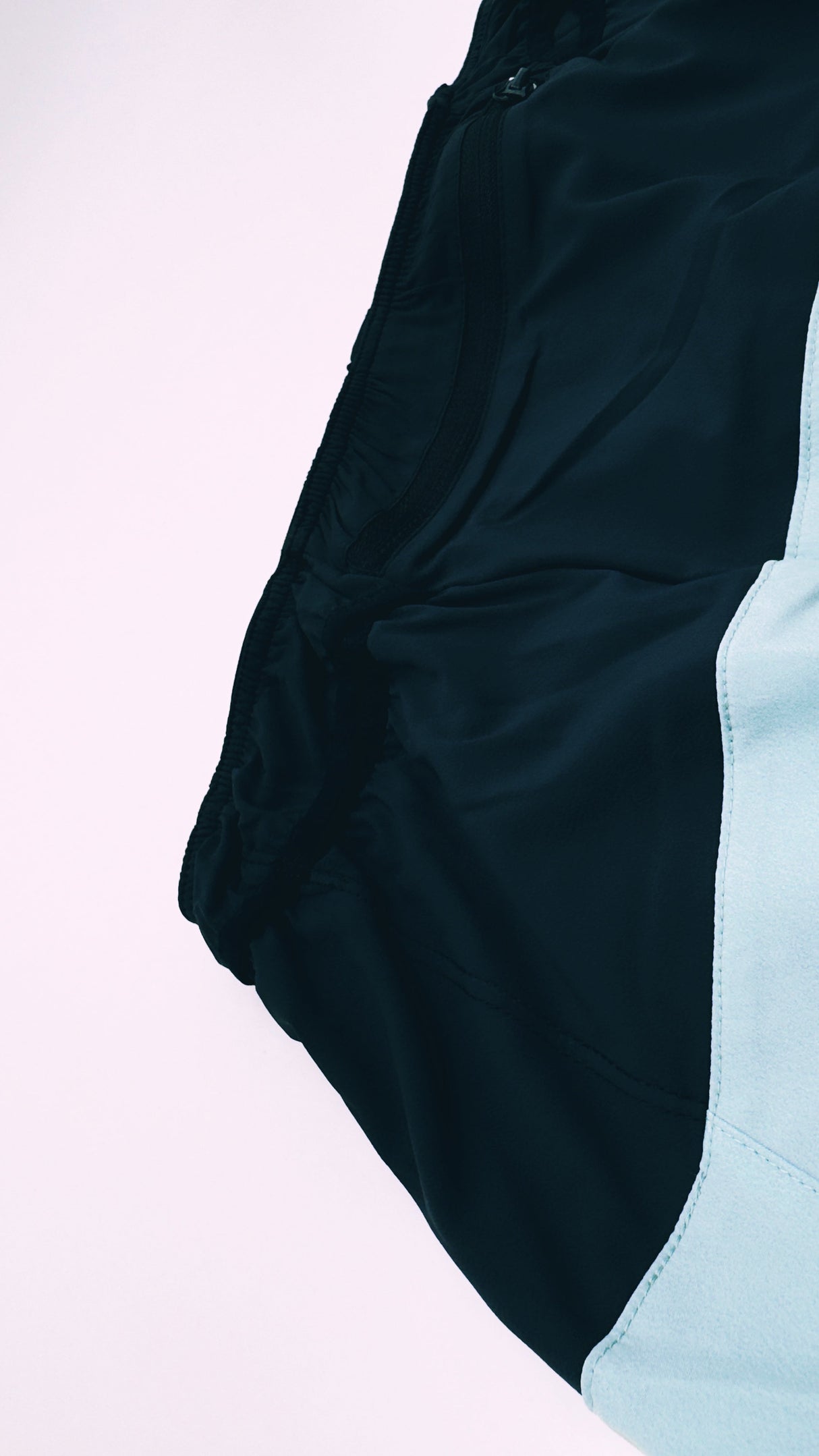 back view of Trail Shorts Pro showing stretch pockets and race-fit design