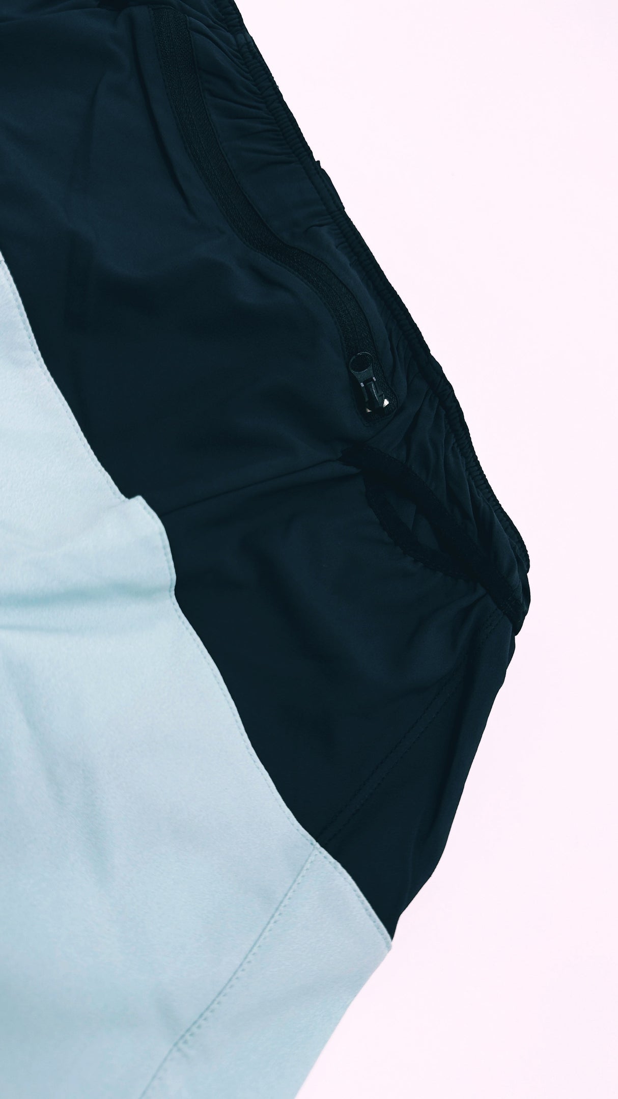 back view of Trail Shorts Pro showing stretch pockets and race-fit design