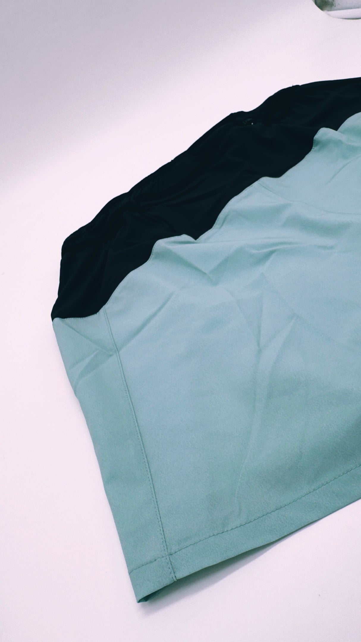 back view of Trail Shorts Pro showing stretch pockets and race-fit design