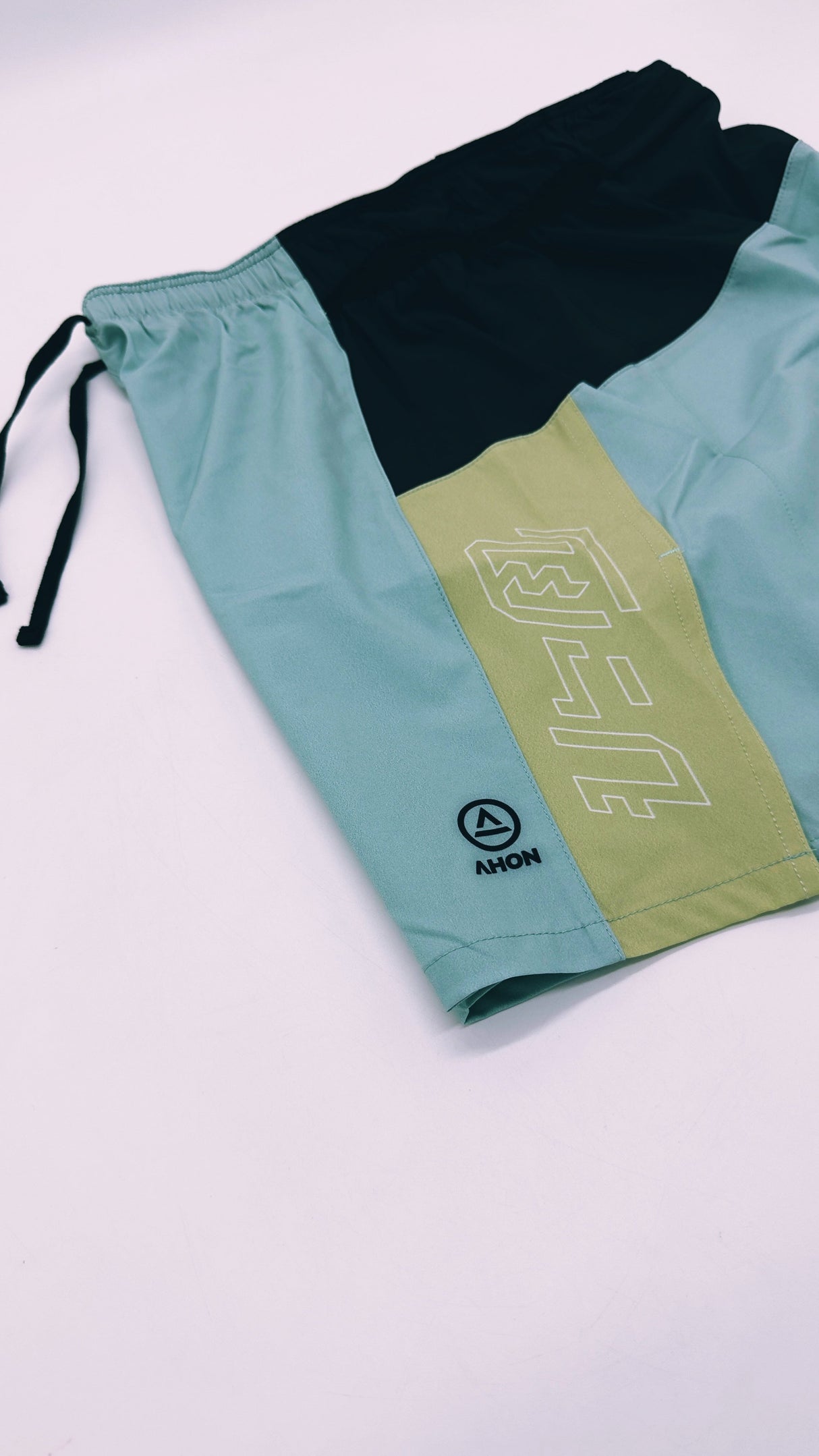 Side view of Trail Shorts Pro showing stretch pockets and race-fit design