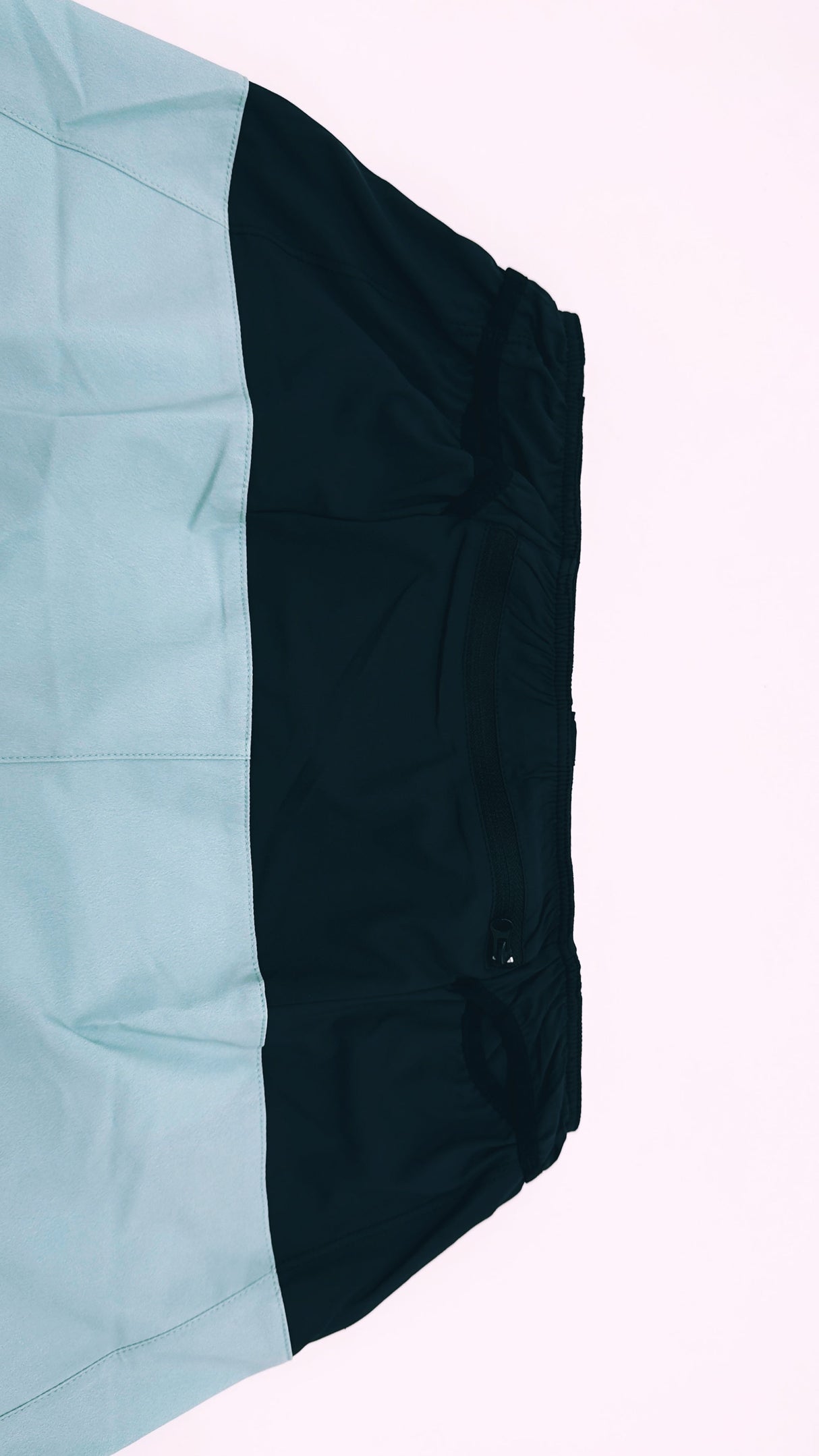 back view of Trail Shorts Pro showing stretch pockets and race-fit design