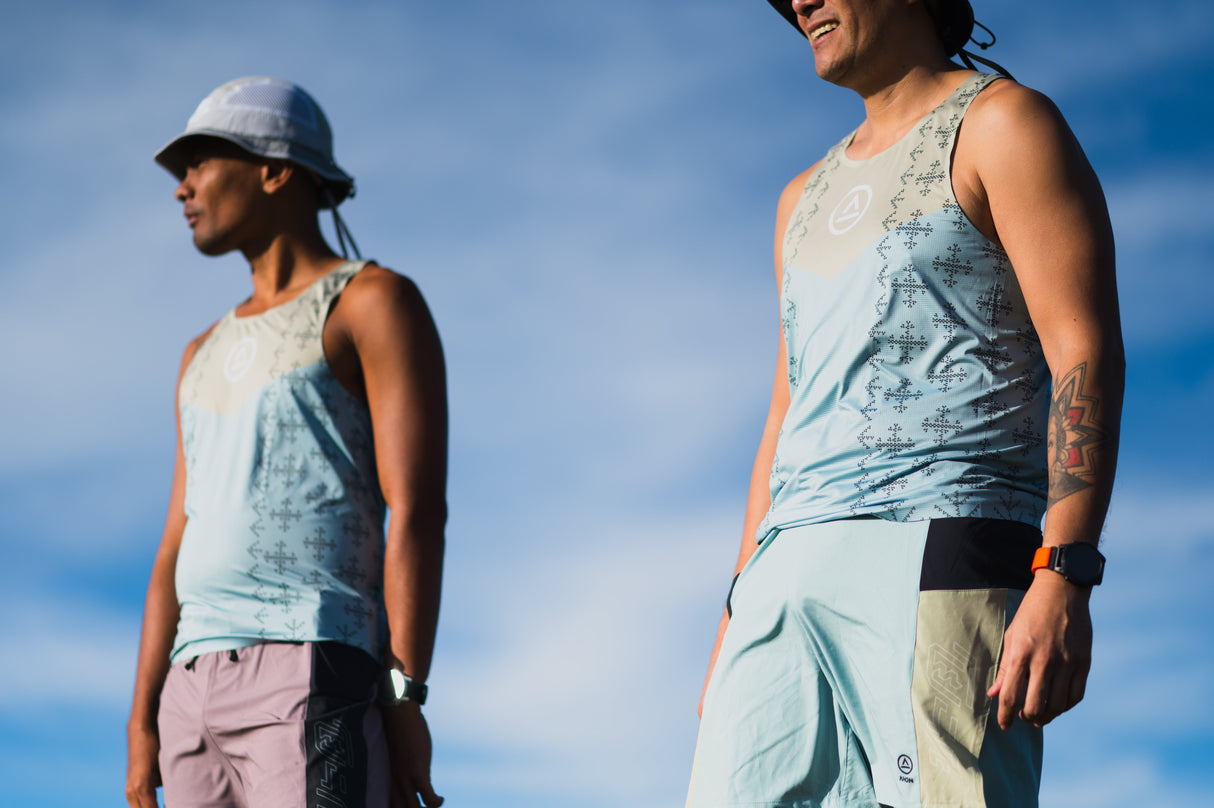 Ahon Trail Shorts Pro Colorway 2 – 5-inch split shorts in light blue and mint, shown on runner