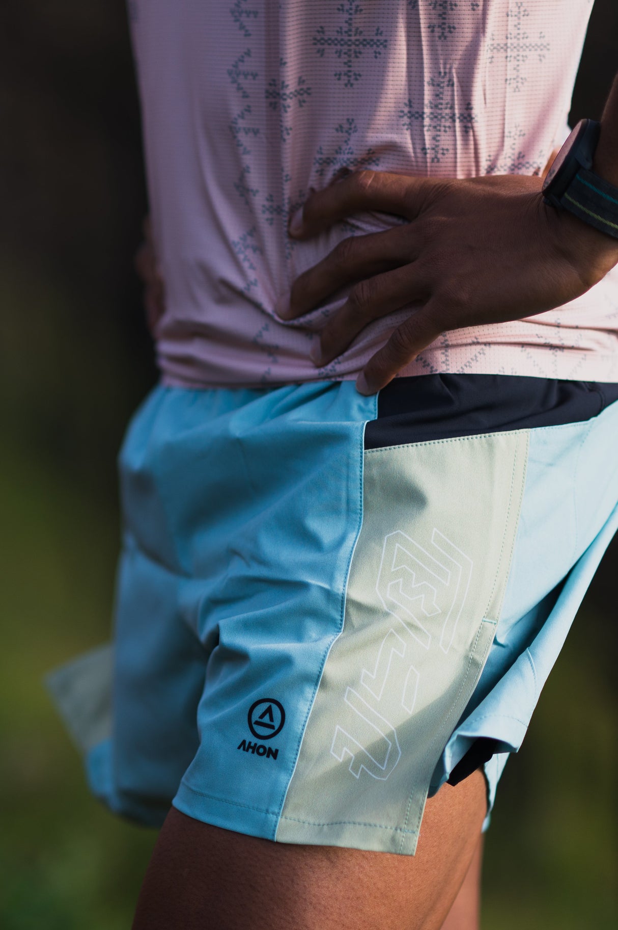 Ahon Trail Shorts Pro Colorway 2 – 5-inch split shorts in light blue and mint, shown on runner