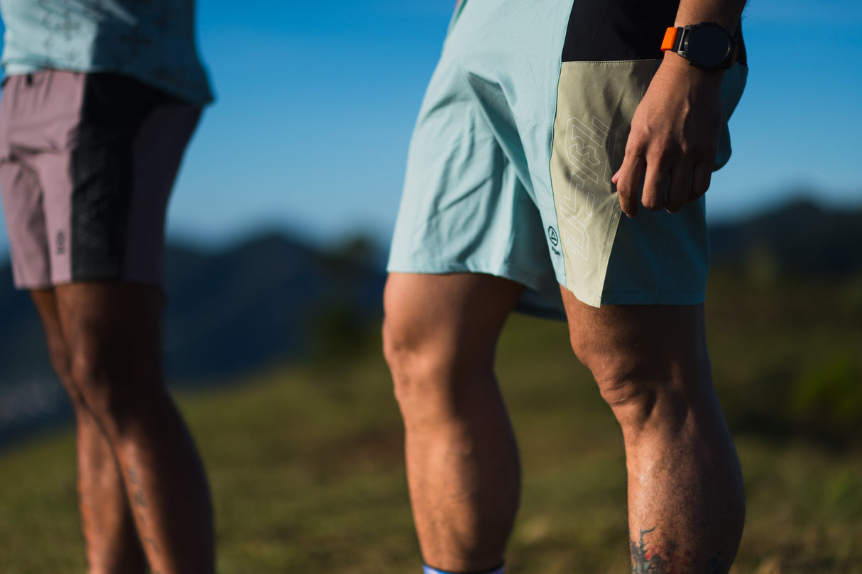 Ahon Trail Shorts Pro Colorway 2 – 5-inch split shorts in light blue and mint, shown on runner