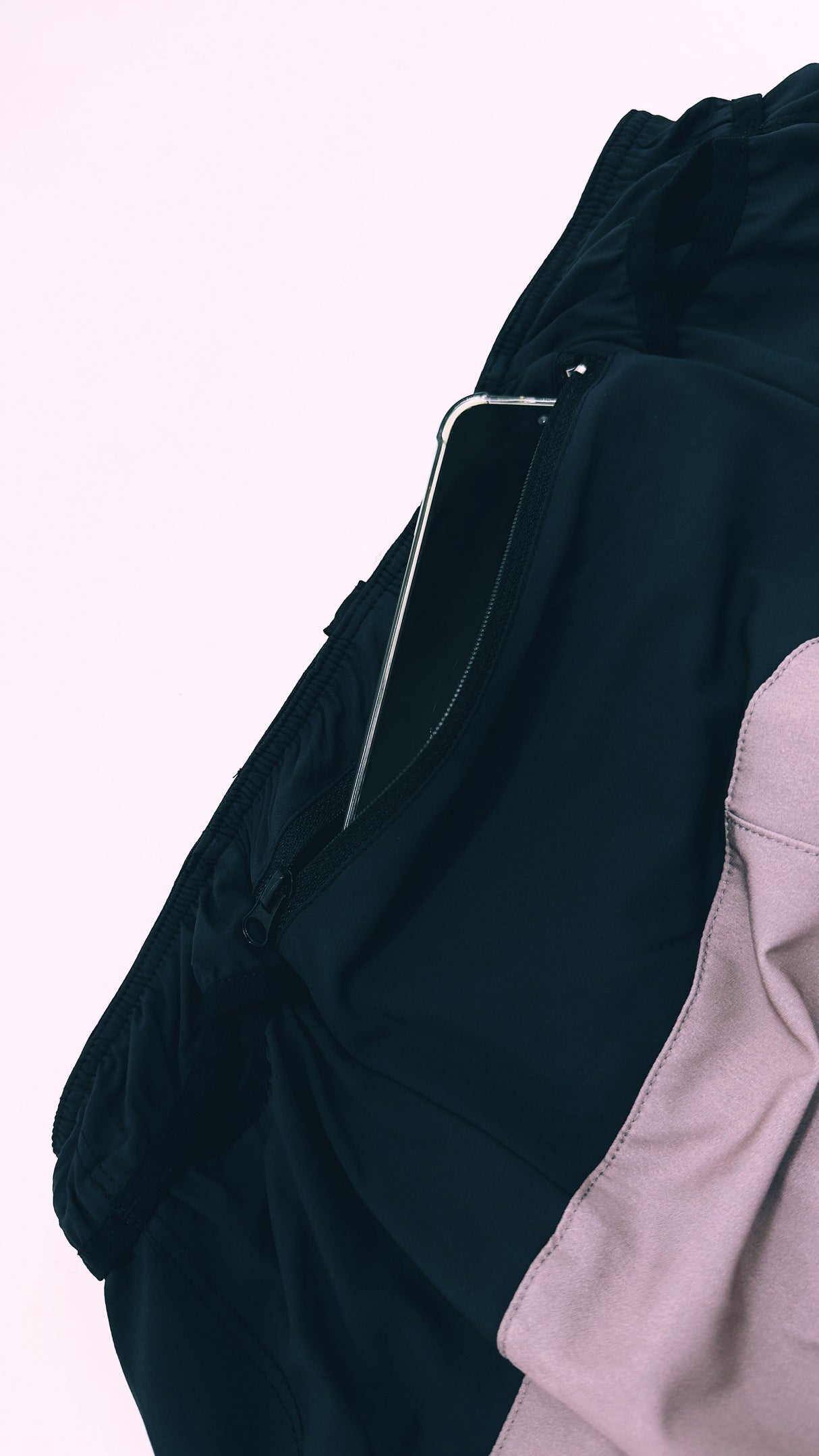 Ahon Trail Shorts Pro (colorway 3) showing a large phone fits its back pocket