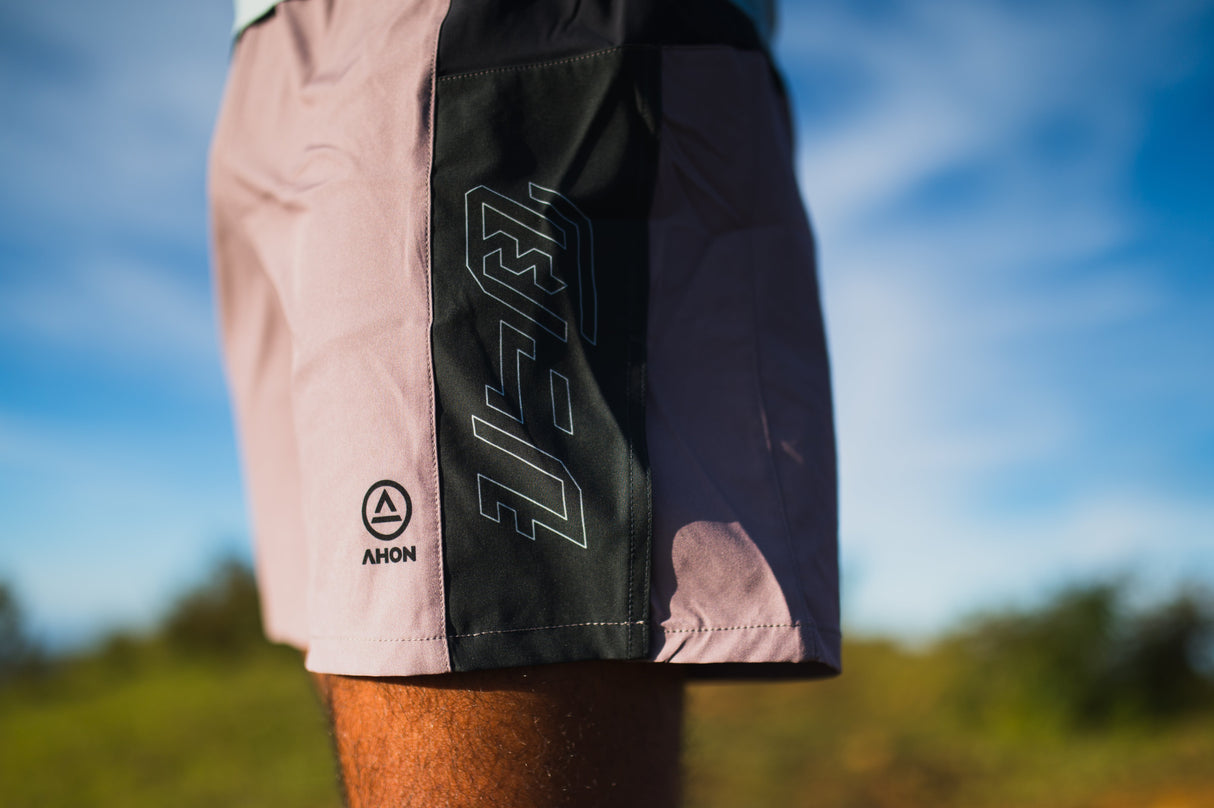 Trail Shorts Pro (colorway 3) worn by a trail runner