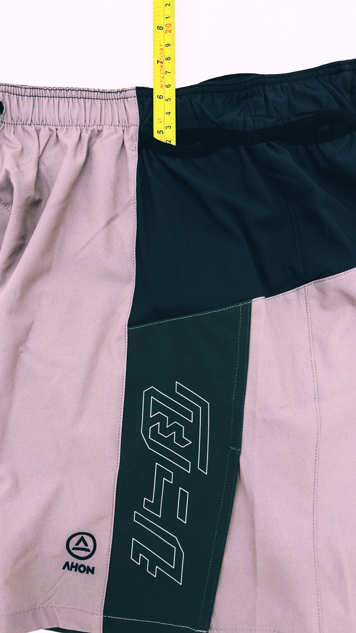 showing how deep the side pockets are of the Ahon Trail Shorts Pro