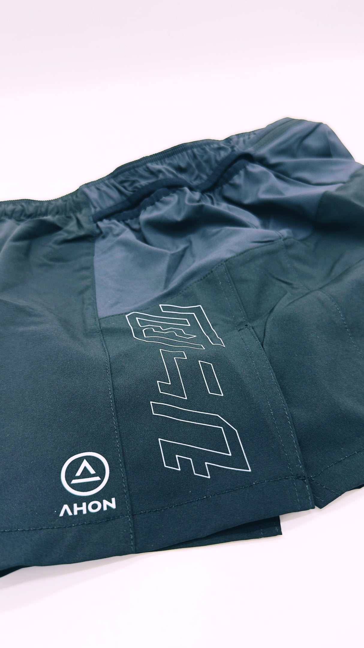 flatlay of Ahon Trail Shorts Pro (Colorway 4), side view