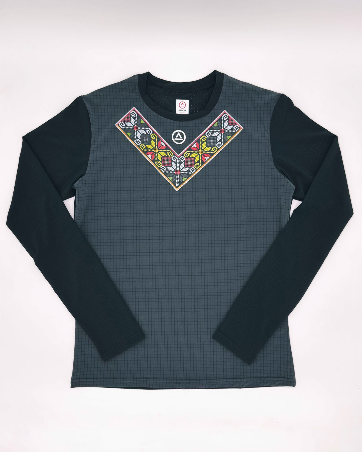 Flatlay of Super Light fabric and chest print on Uleyan shirt, highlighting breathable texture