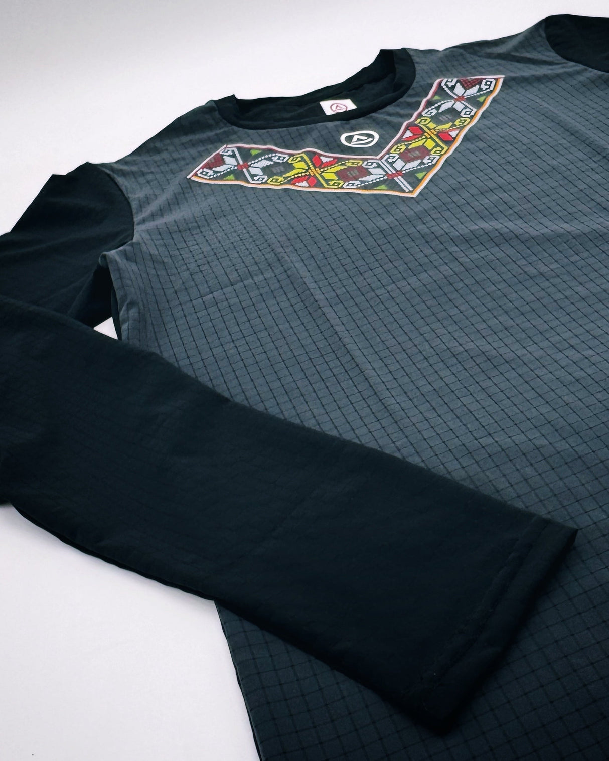 Close-up of Super Light fabric and chest print on Uleyan shirt, highlighting breathable texture