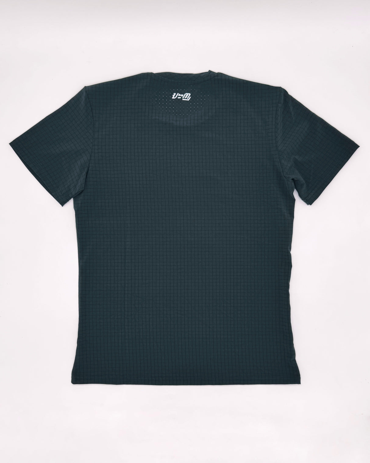 Close-up of back design or shirt texture highlighting breathable Super Light fabric in black/gray colorway