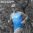 Male trail runner in Ahon blue green Ultra Light Singlet running through forest trail, wearing a cap and sunglasses