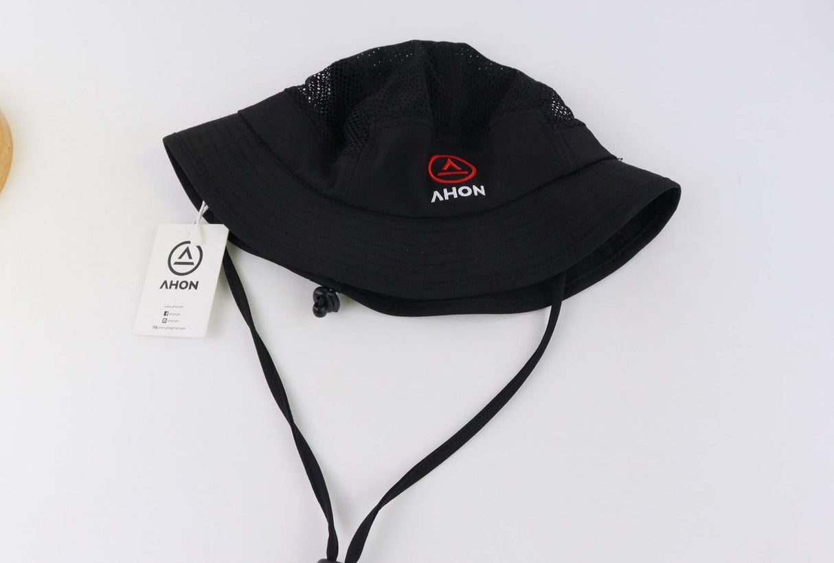 Folded Ahon bucket hat showing packability and soft material