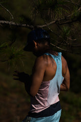 Singlet Pro on trail – side profile showcasing armhole and fit