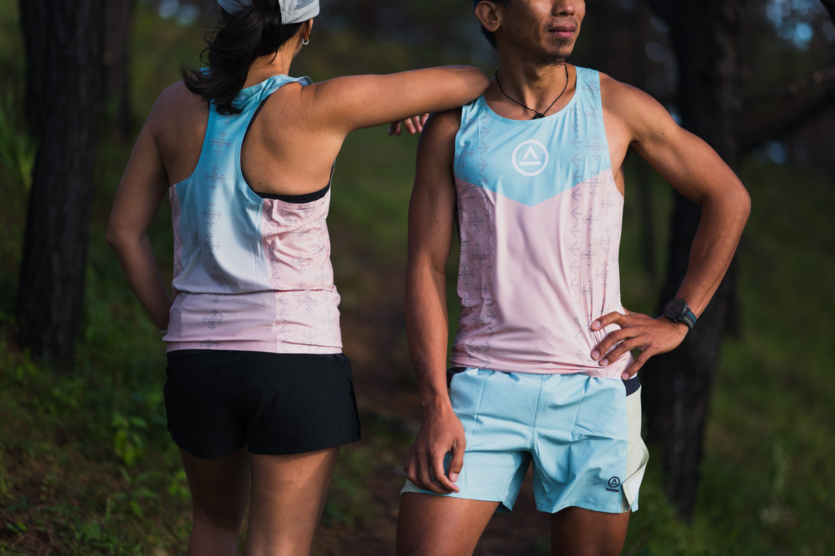 trail runners showing off fit and fabric texture of Ahon’s race singlet