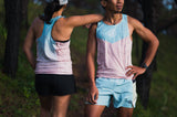 trail runners showing off fit and fabric texture of Ahon’s race singlet